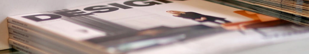 Stack of magazines with the title Design